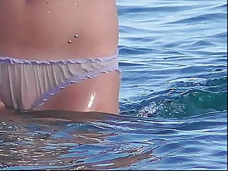 beach girl goes for swimming in panties - watch out,,